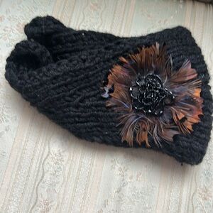 NWOT.  Knit Headband.  Black with feather & beads